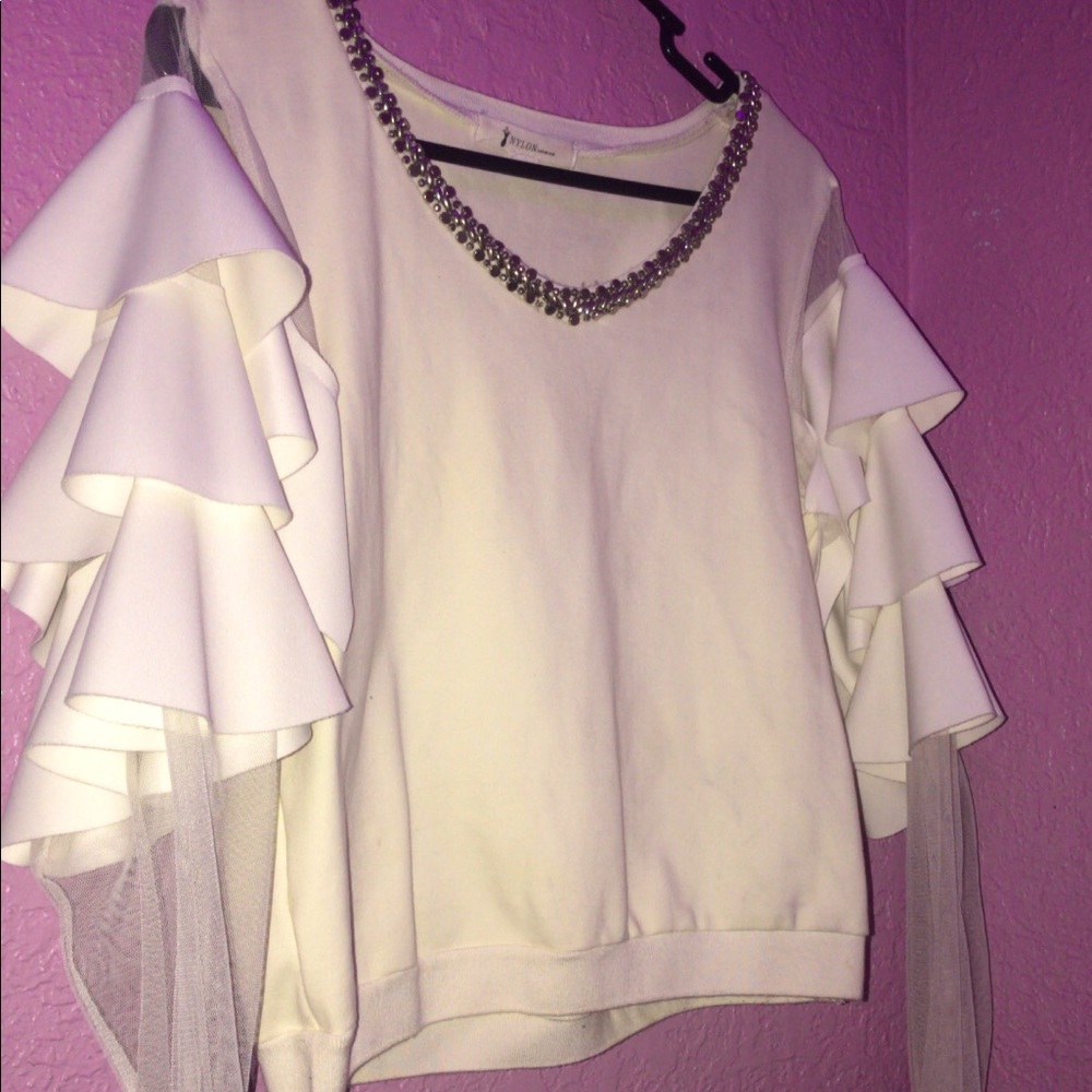 Floral top with rhinestones.